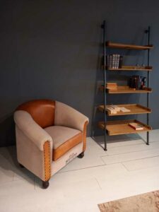 Poltrona vintage in cuoio e tessuto per angolo lettura